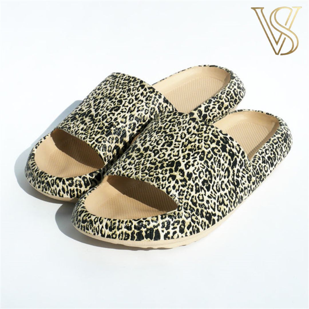 Bold leopard print platform slides with a textured animal pattern and high-density cushioned sole, adding a statement piece to the vstyles line.