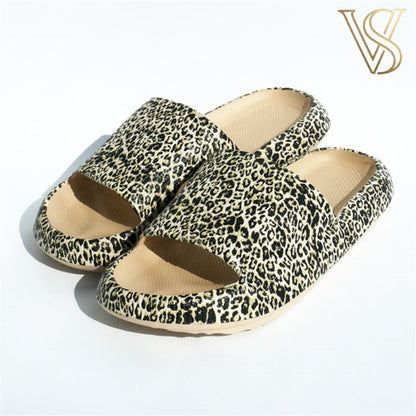 Bold leopard print platform slides with a textured animal pattern and high-density cushioned sole, adding a statement piece to the vstyles line.