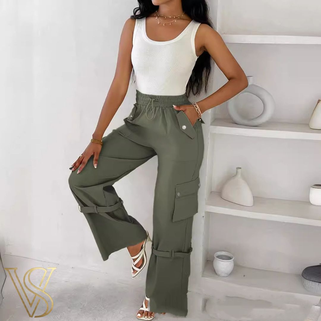 Olive green high-waisted cargo pants with a wide-leg silhouette, featuring an elastic drawstring waist and adjustable buckle straps on the legs, part of the vstyles ready-to-wear line.