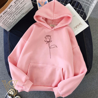 Charming light pink oversized hoodie with a delicate black single-line rose drawing, adding a soft touch to the vstyles line.