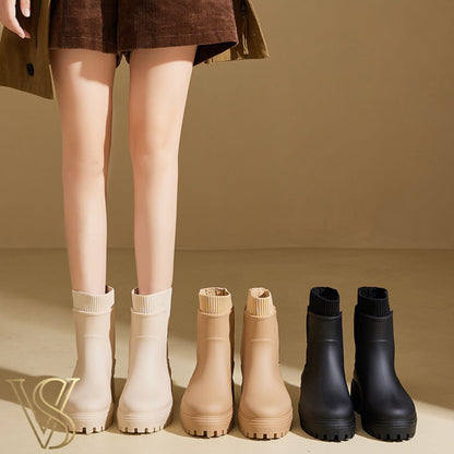 Women's chunky lug sole ankle boots featuring a matte waterproof finish and a comfortable ribbed knit sock collar, shown in cream, beige, and black.