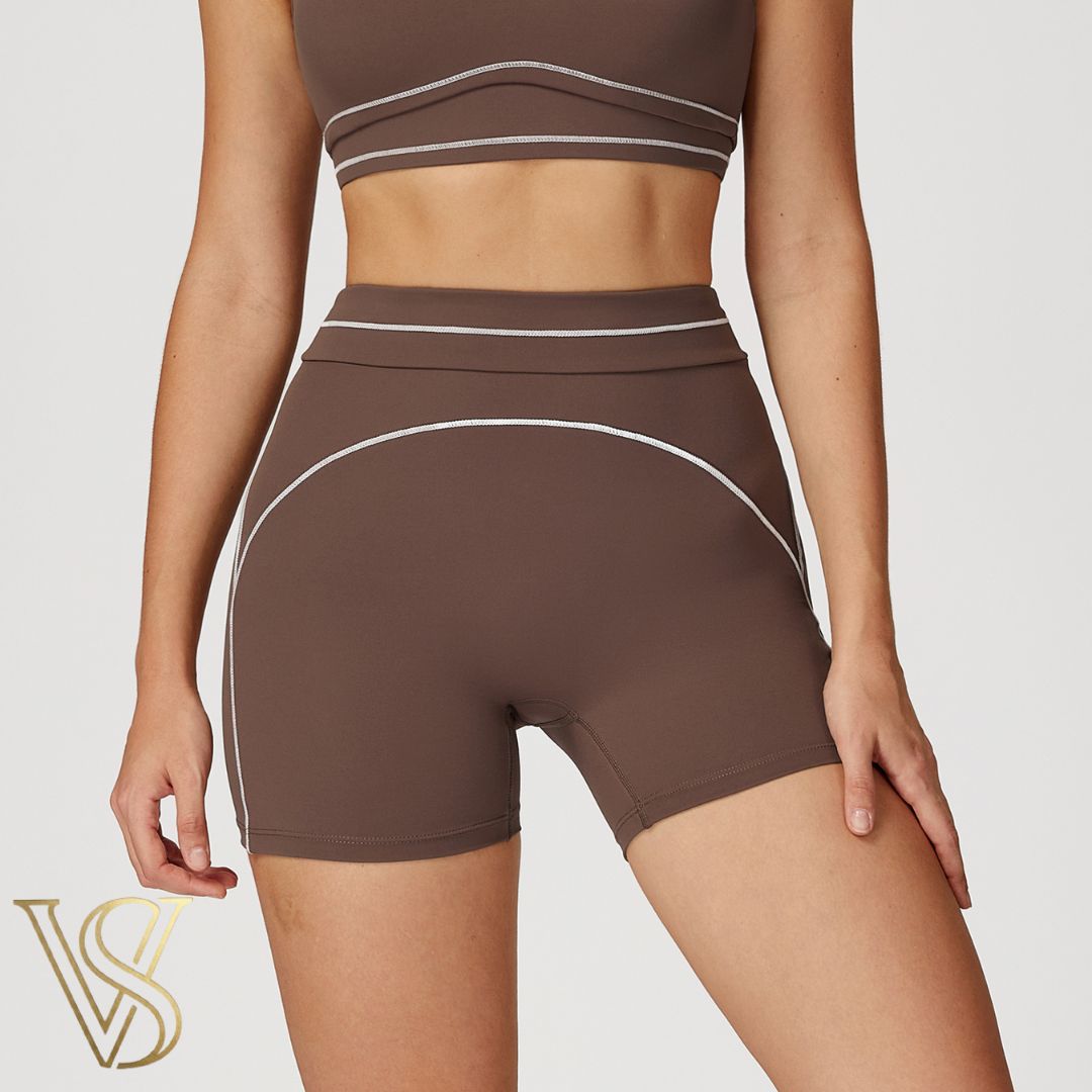 Dark brown high-waisted workout shorts with white piping details, part of the vstyles activewear collection.