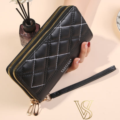 Black long wallet featuring contrast diamond-patterned stitching, double zipper closure, and wristlet.