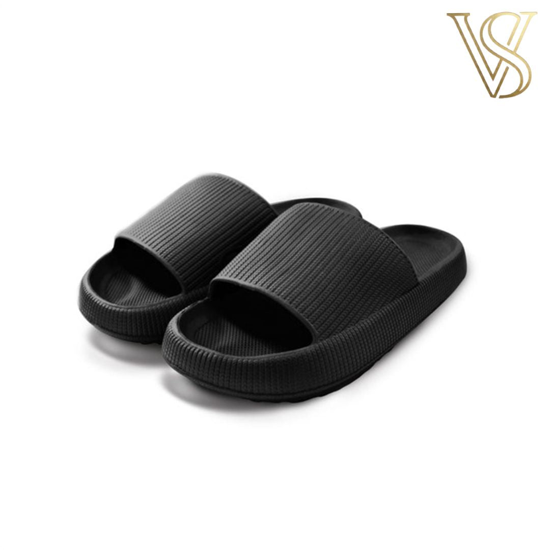 Classic black platform cloud slides with a sleek, seamless finish and superior cushioning for all-day wear from vstyles.